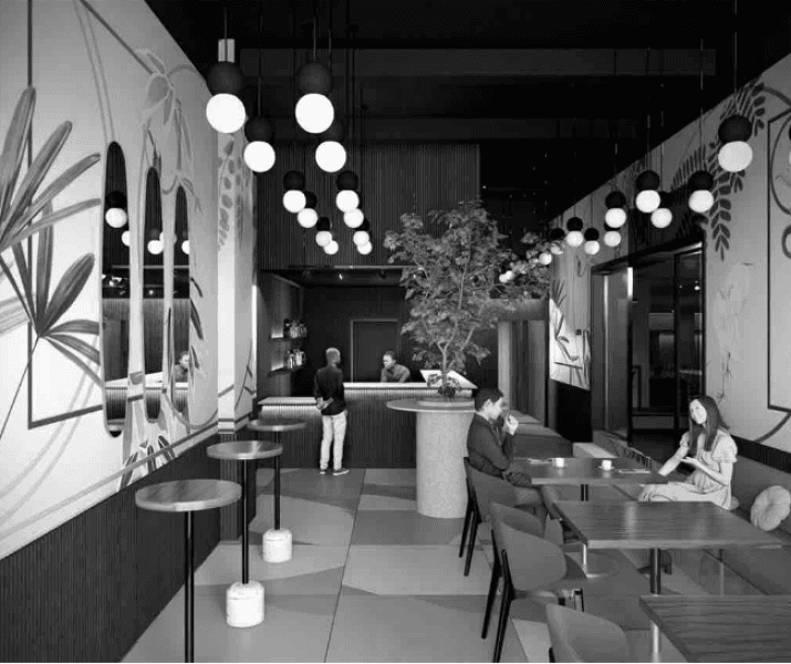 Additional view of the spacious hotel-style lobby with tables and seating